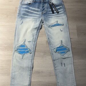 AMIRI Light Blue Distressed Skinny Jeans